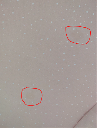 Nido Petite Marmotte rosa lunares