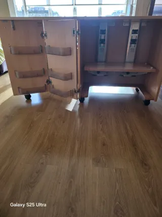 Mueble para máquina de coser con elevador