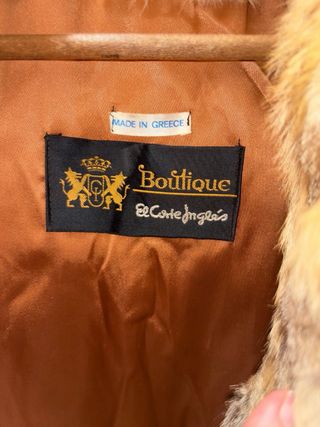 Chaqueta de pelo beige y marrón