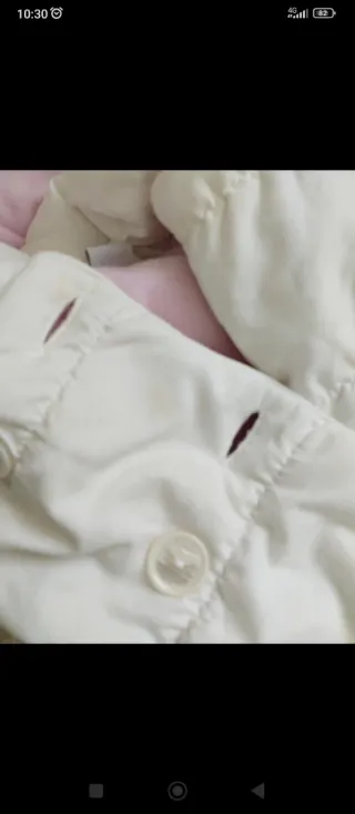 Giubbotto bianco con cappuccio rosa