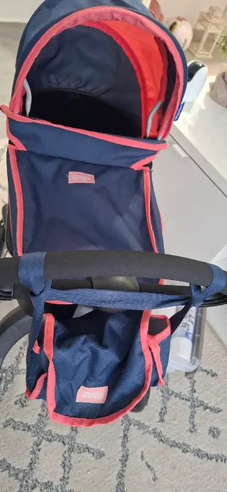 Carrito de muñecas azul y rosa