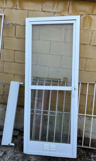 Puerta aluminio y cristal climalit