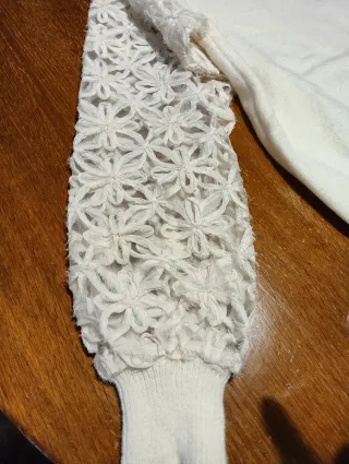 Maglie eleganti con design unico sulle maniche