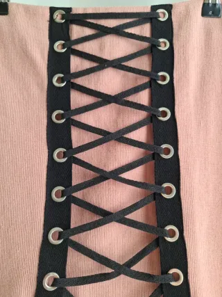 Falda mini rosa con cordones