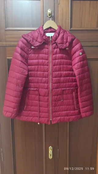 Parka de plumas. Muy ligera. No pesa nada