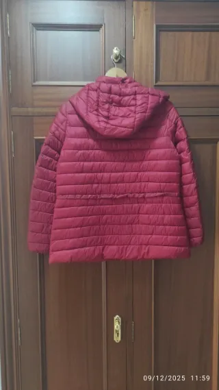 Parka de plumas. Muy ligera. No pesa nada