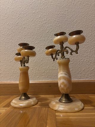 Candelabri di pietra e metallo