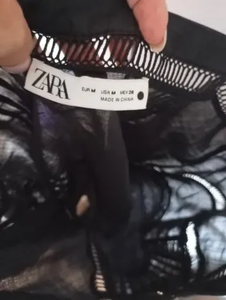 Vestido negro con detalles