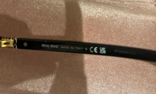 Gafas de sol Miu Miu negras y rosas