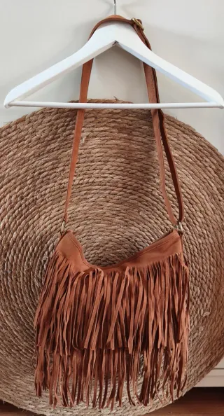 Bolso de piel con flecos