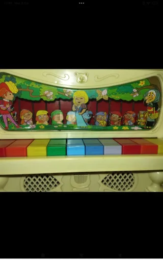 Piano de Juguete Musical con Figuras