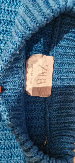 Jersey lana azul con flecos