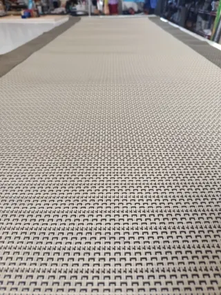 Alfombra vinilo beige y marrón