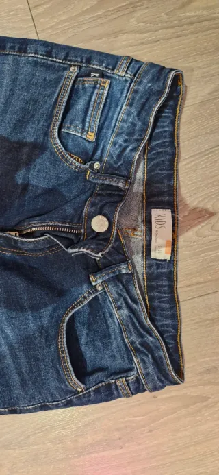 Pantalón tejano niña acampanado