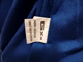 Chaqueta juvenil azul con detalles blancos