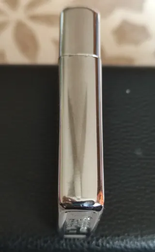 Encendedor Zippo plateado grabado