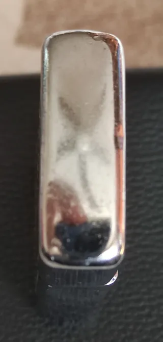 Encendedor Zippo plateado grabado