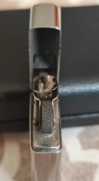 Encendedor Zippo plateado grabado