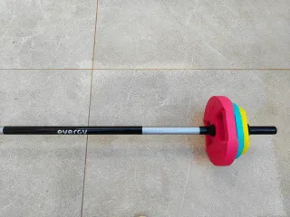 Barra de pesas con discos