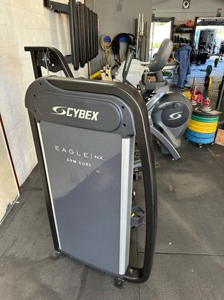 Cybex Arc Trainer y Curl Bíceps