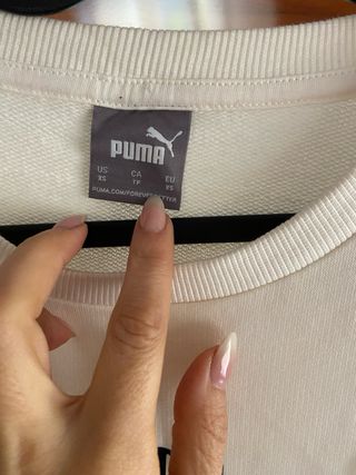 Sudadera larga Puma beige.