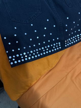 Gonna jeans mini con borchie