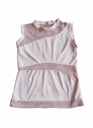 Top rosa con detalles de malla