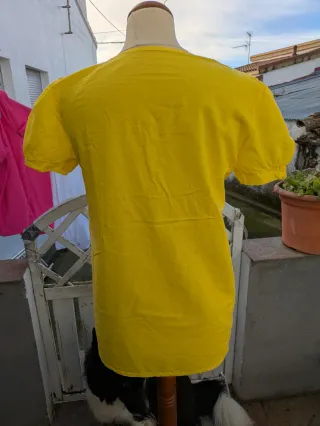 Blusa amarilla manga corta talla M