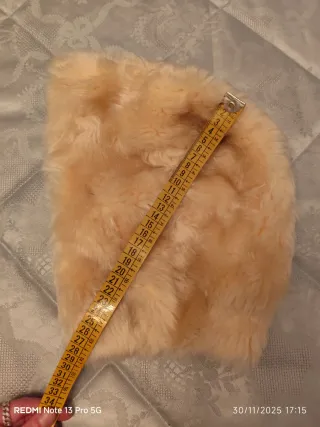 Capucha de pelo beige