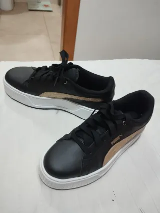 Zapatillas Puma niña negras y doradas