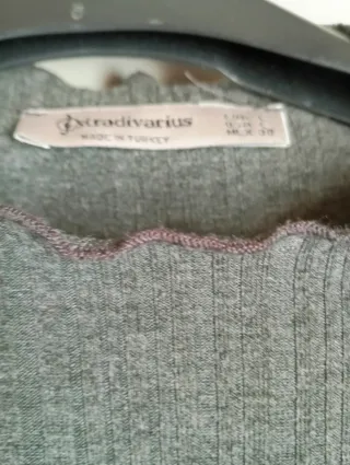 Blusa gris de manga larga