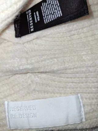 Cappello turbante con spilla farfalla