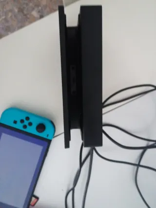 Nintendo Switch + Mando Mario + FIFA 22