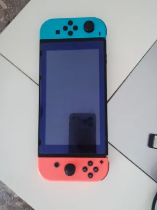 Nintendo Switch + Mando Mario + FIFA 22