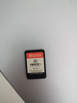 Nintendo Switch + Mando Mario + FIFA 22