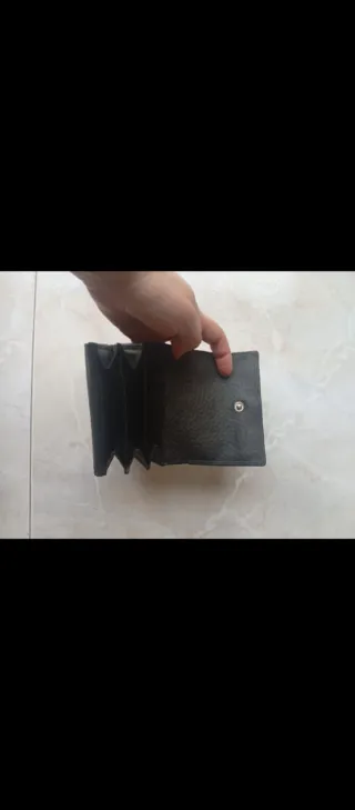 Cartera negra nueva a estrenar