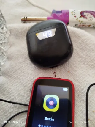 Encendedor unicornio y audífonos