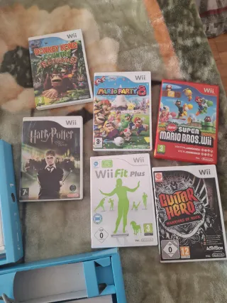 Nintendo Wii con 6 juegos y tabla Wii Fit Plus