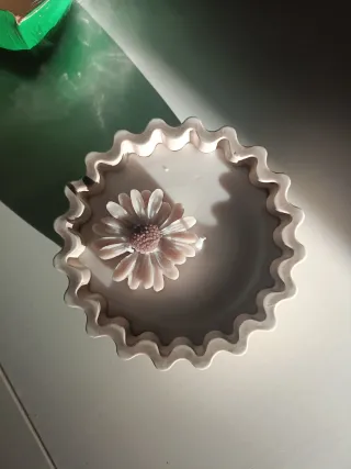 Candela in ceramica con fiore