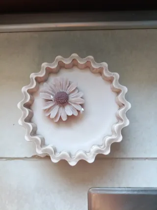 Candela in ceramica con fiore