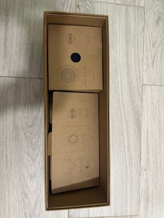 Secador de pelo Dyson gris y rosa