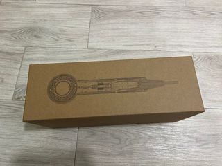 Secador de pelo Dyson gris y rosa