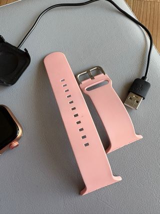 Reloj inteligente Dorado y Rosa con Cargador