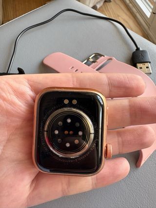 Reloj inteligente Dorado y Rosa con Cargador