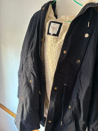 Abrigo negro con forro beige