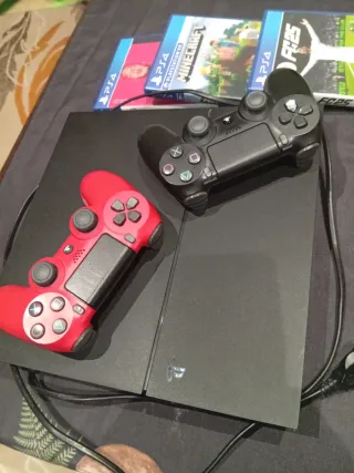 PlayStation 4 Slim 500 g con tres juegos i dos man