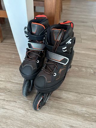 Patines en línea Oxelo negros y naranjas