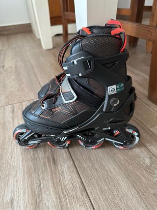 Patines en línea Oxelo negros y naranjas