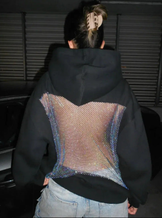 Sudadera blanca con brillo plateado