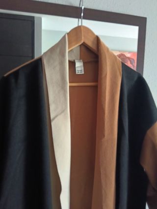 Abrigo largo con flecos